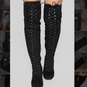 Over the knee flat boots